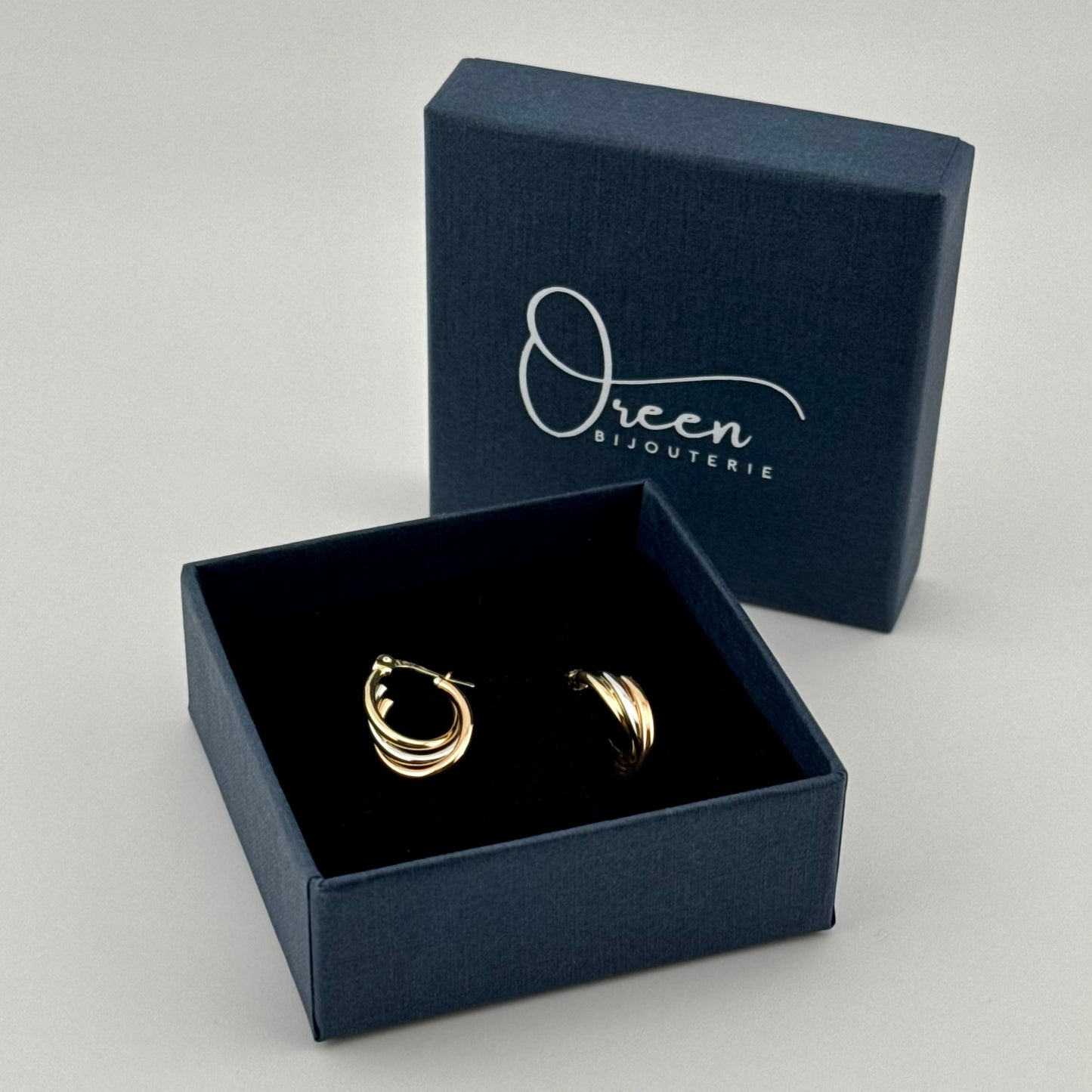 Boucles d'oreilles créoles tricolores en Or 750 (18 carats)