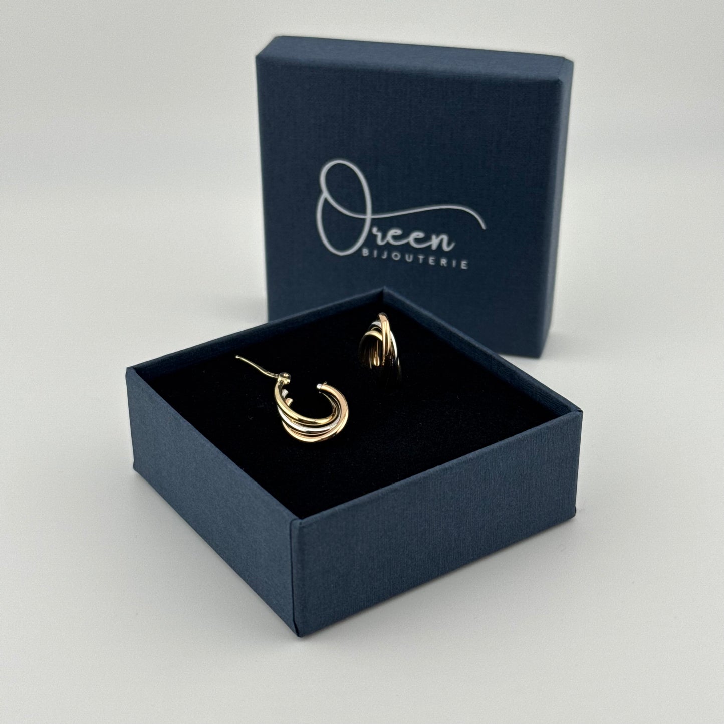 Boucles d'oreilles créoles tricolores en Or 750 (18 carats)
