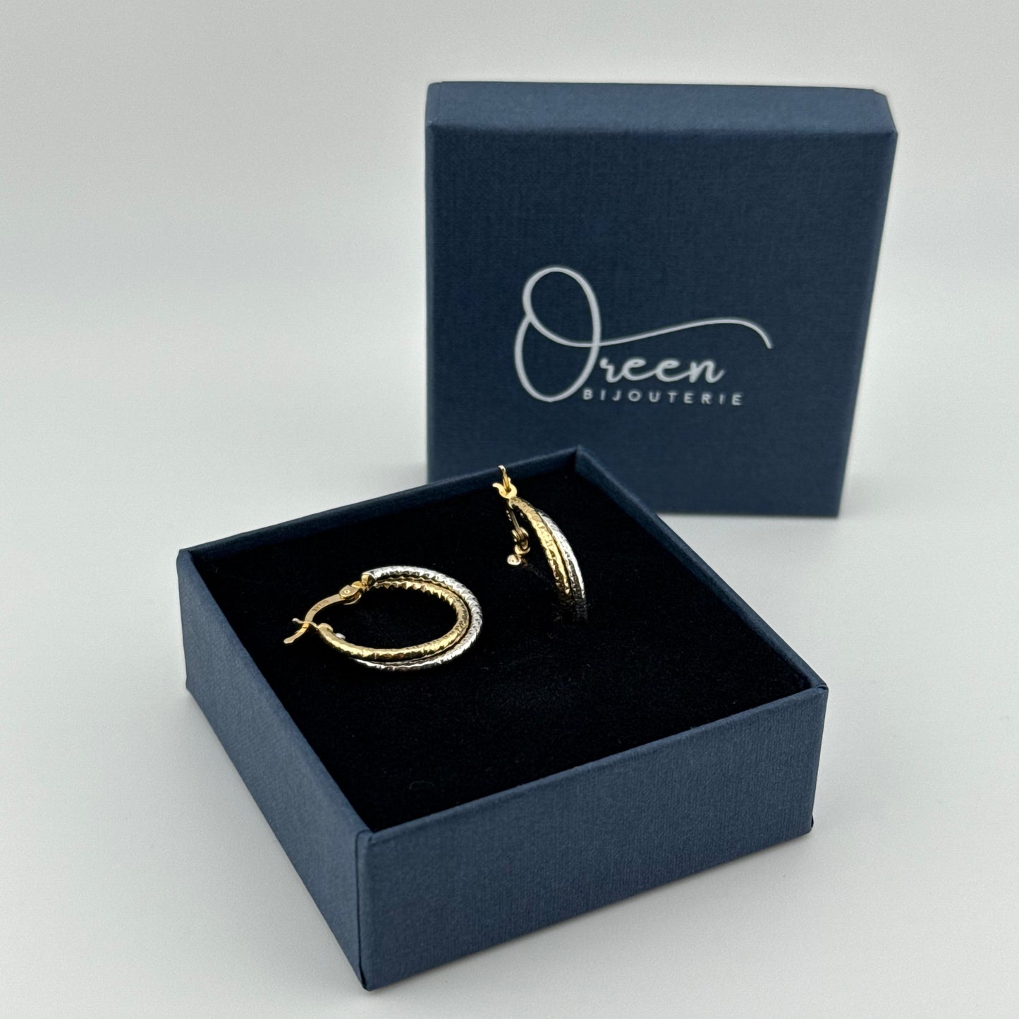 Boucles d'oreilles créoles bicolores en Or 750 (18 carats)